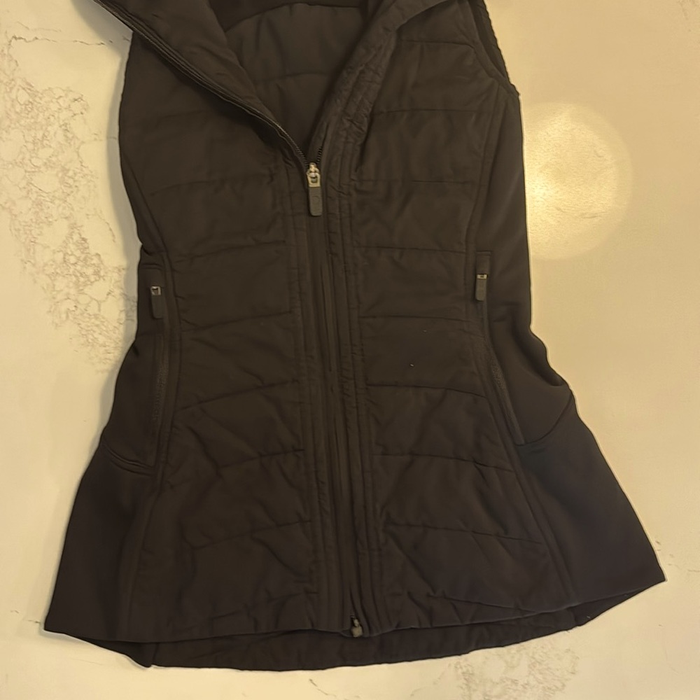 Lululemon down for it all vest. Runs on the small side. Perfect no tags.
